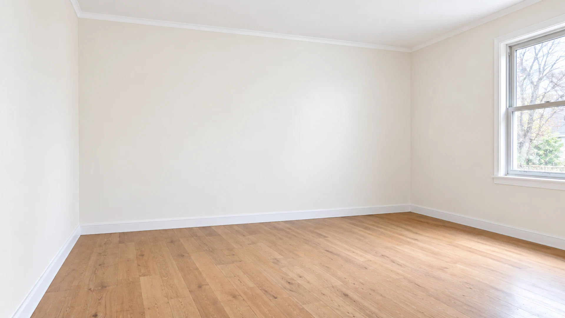 Generated demonstration of an empty room changing from worn, stained walls to a smooth off-white painted finish